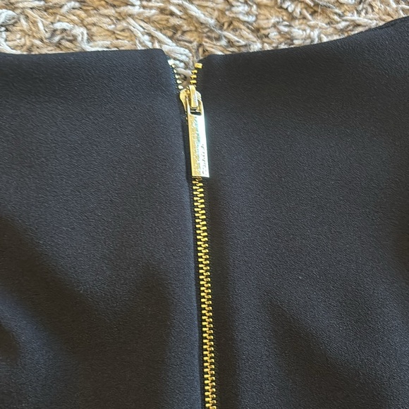 Calvin Klein's dress skims stretch, with button-accent bell sleeves for flair. - Picture 10 of 12